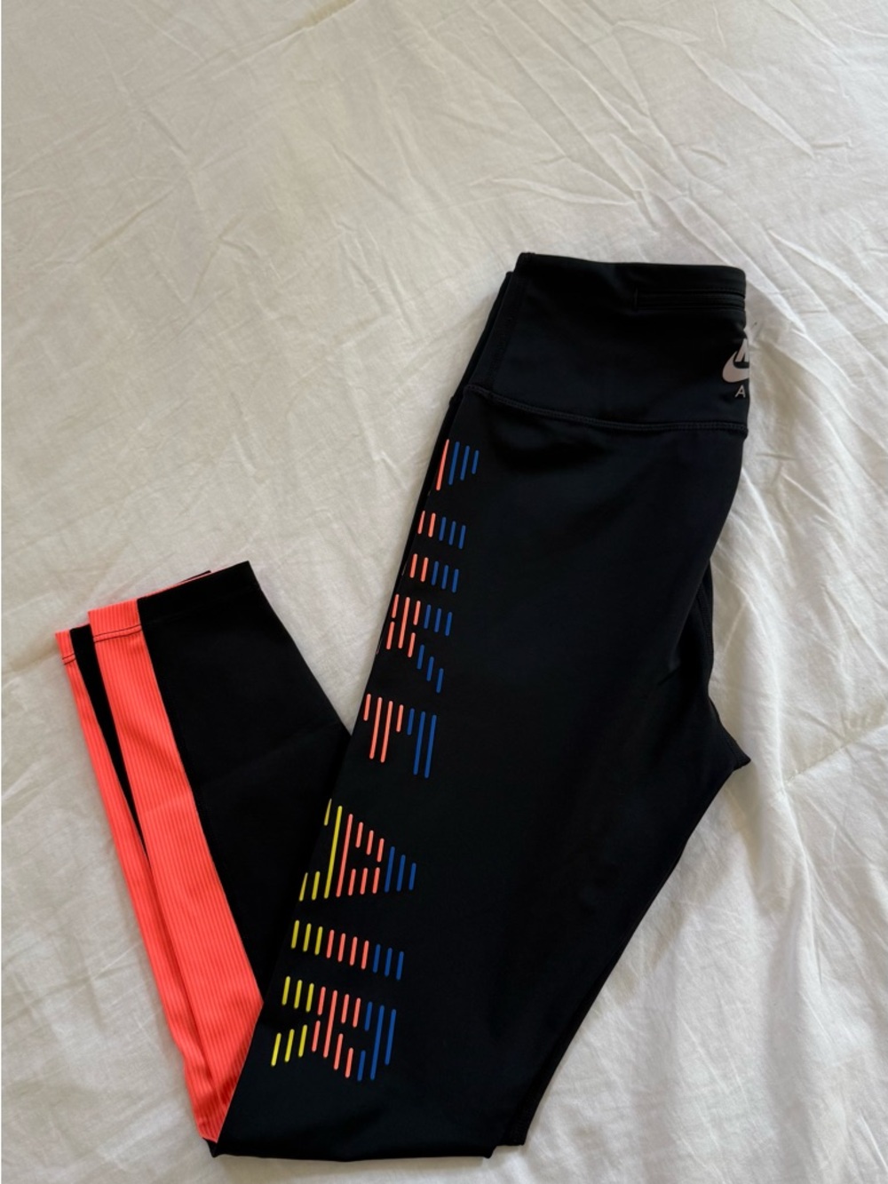 Nike Girls Black Leggings with Coral Side Stripe and Multicolor Accents